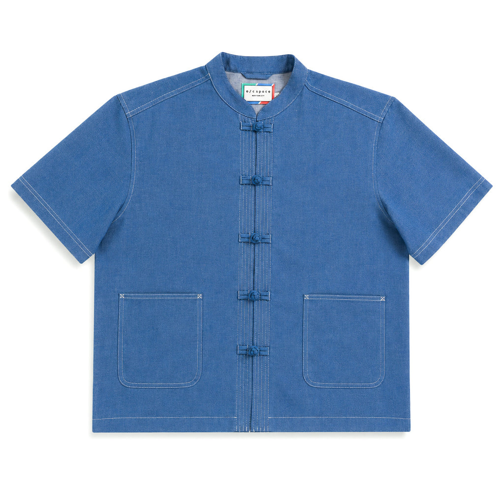 A blue short-sleeve button-up shirt with traditional Chinese frog closures and two front patch pockets, laid flat on a white background.