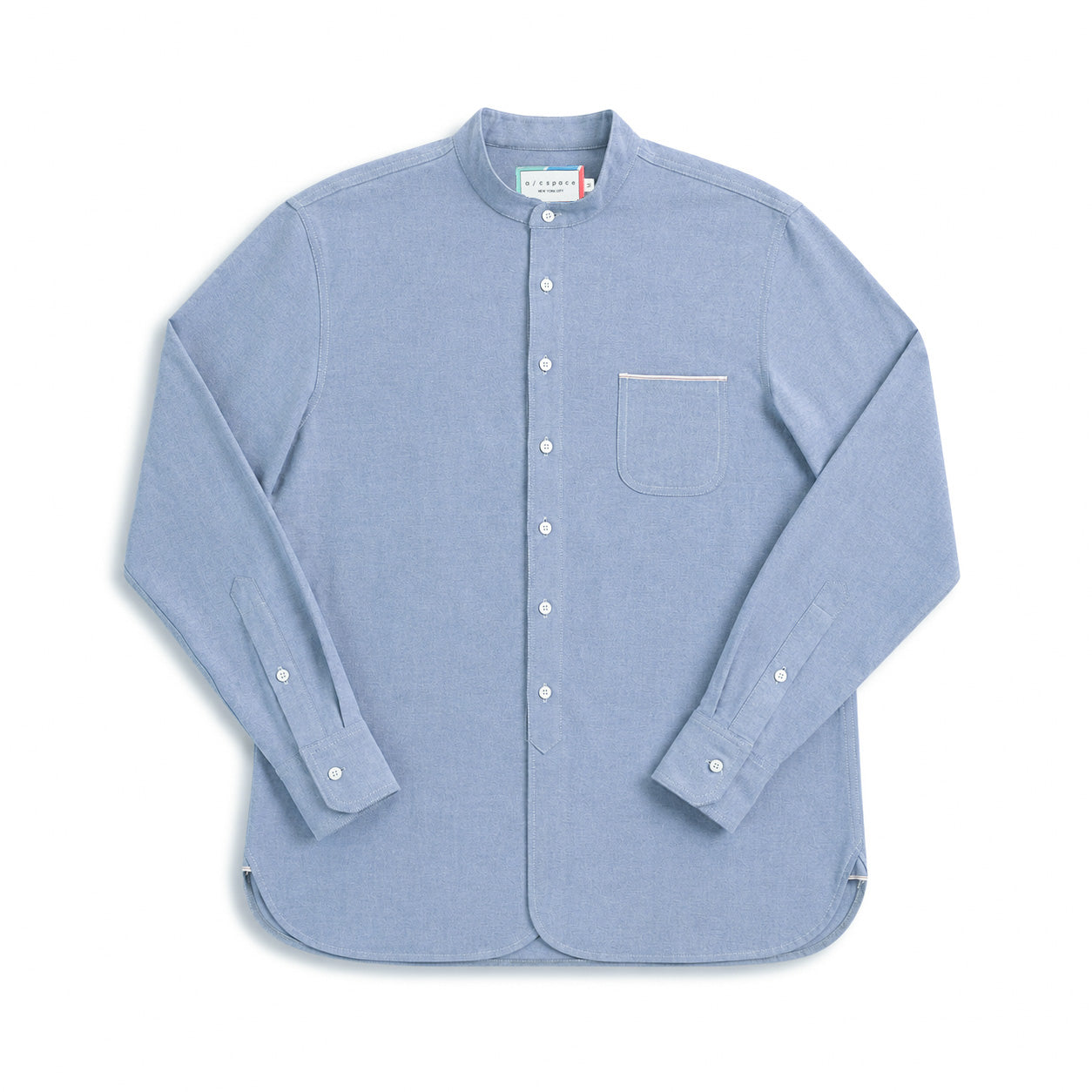 A light blue long-sleeve button-up shirt with a mandarin collar, laid flat on a white background. It features a single chest pocket with a thin white stripe detail and white buttons.