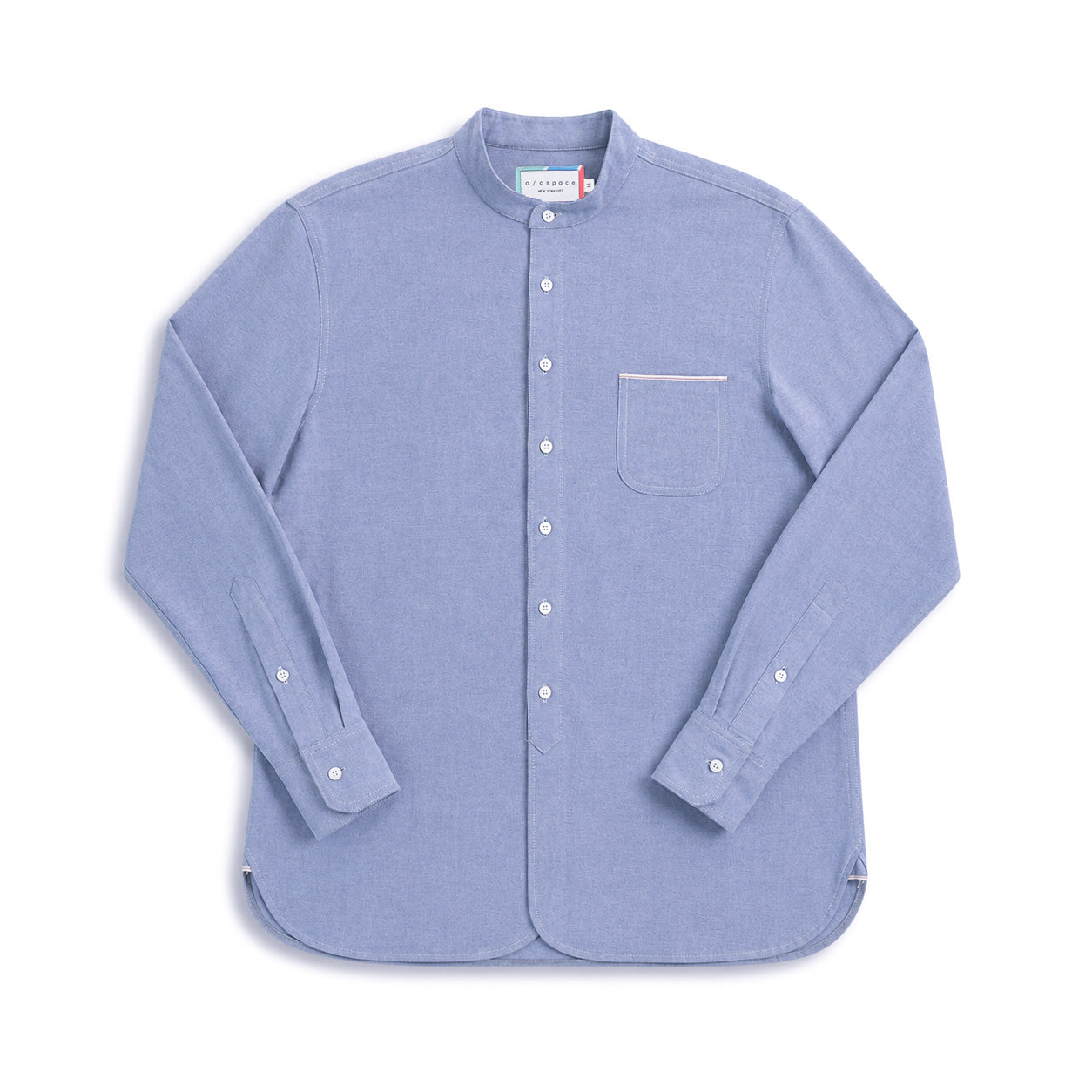 A light blue long-sleeve button-up shirt with a mandarin collar, laid flat on a white background. It features a single chest pocket with a thin beige stripe detail, white buttons, and a visible 'Fruit of the Loom' neck label.