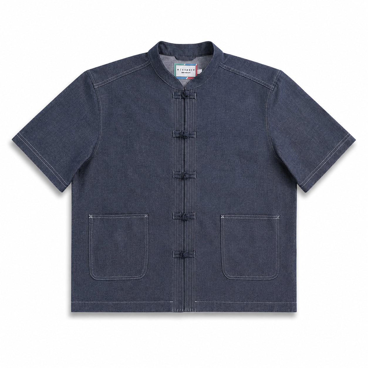 A dark indigo blue short-sleeve mandarin collar jacket with traditional Chinese frog closures and two front patch pockets, shown flat on a white background.